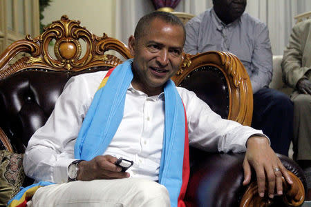 Democratic Republic of Congo's opposition Presidential candidate Moise Katumbi talks to his supporters after leaving the prosecutor's office in Lubumbashi, the capital of Katanga province of the Democratic Republic of Congo, May 11, 2016. REUTERS/Kenny Katombe/File Photo