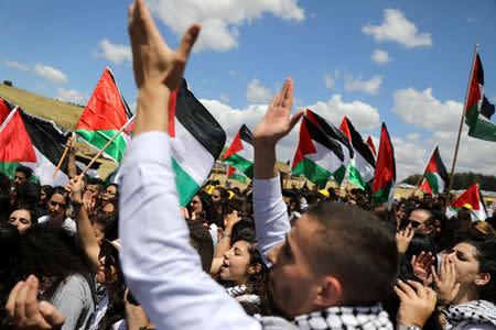 Members of Israel's Arab minority take part in a rally marking the "Nakba" or "Catastrophe", when Palestinians lament the loss of their homeland in the 1948-49 war, that caused the creation of Israel, near the abandoned village of Khubbayza, northern Israel May 9, 2019. REUTERS/Ammar Awad