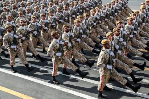 Iranian soldiers march during a parade marking the anniversary of the outbreak of the devastating 1980-1988 war with Iraq