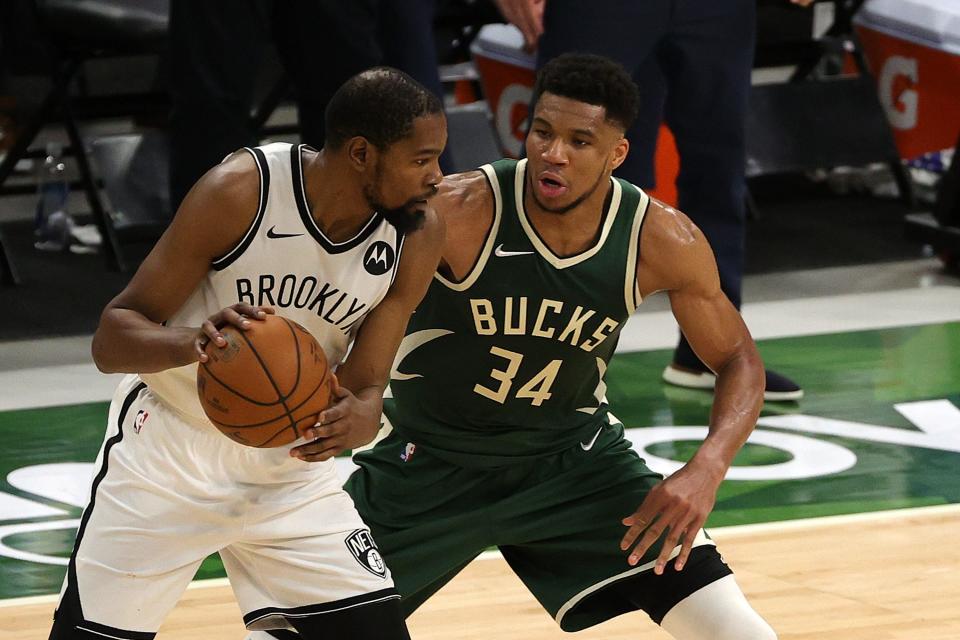 Kevin Durant (left) and Giannis Antetokounmpo (34), two of the early leaders in the MVP race, have both been placed in the league's health and safety protocols in recent days.