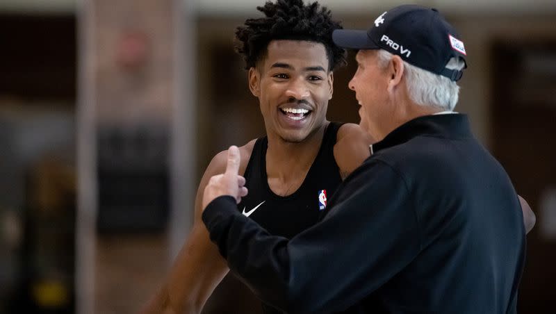 Jazz forward Ochai Agbaji talks to CEO Danny Ainge during a Utah Jazz practice at the Zions Bank Basketball Campus in Salt Lake City on Thursday, Sept. 29, 2022.