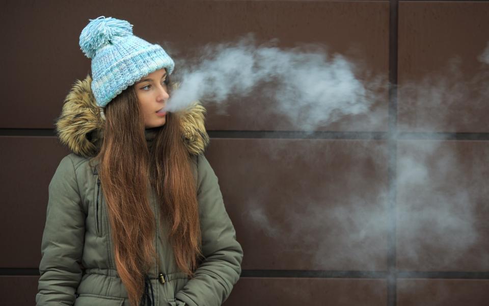 Vaping teenager - Aleksandr Yu/iStockphoto