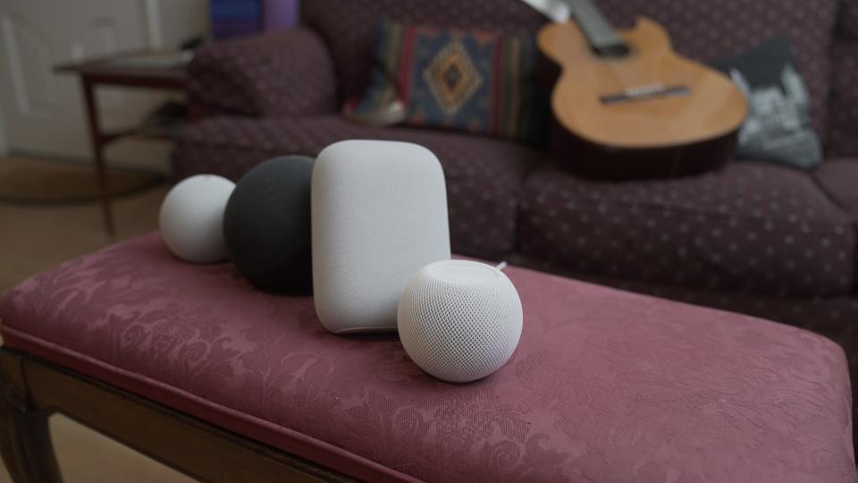 From back to front: new Amazon Echo Dot, Echo (4th generation), Google's Nest Audio and Apple's HomePod Mini.