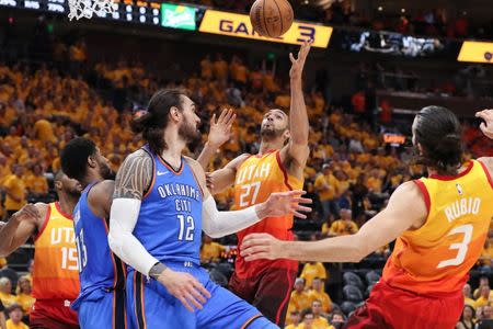 FILE PHOTO: Apr 21, 2018; Salt Lake City, UT, USA; Utah Jazz center Rudy Gobert (27) grabs an offensive rebound during the third quarter against the Oklahoma City Thunder in game three of the first round of the 2018 NBA Playoffs at Vivint Smart Home Arena. Mandatory Credit: Chris Nicoll-USA TODAY Sports/File Photo