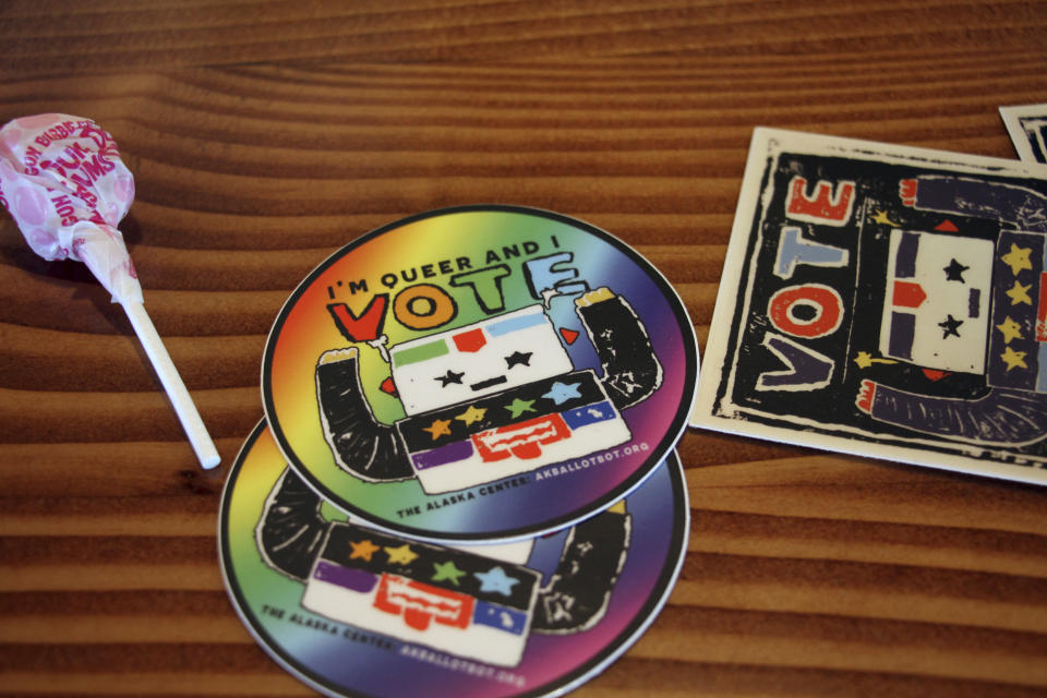 This July 28, 2022, photo shows stickers put out for people during a mock election at Cafecito Bonito in in Anchorage, Alaska, where people ranked the performances by drag performers. Several organizations are using different methods to teach Alaskans about ranked choice voting, which will be used in the upcoming special U.S. House election. (AP Photo/Mark Thiessen)