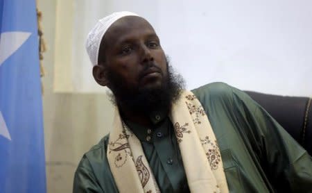 FILE PHOTO: Former al Shabaab leader Mukhtar Robow Abu Mansur attends a news conference in Mogadishu, Somalia August 15, 2017. REUTERS/Feisal Omar