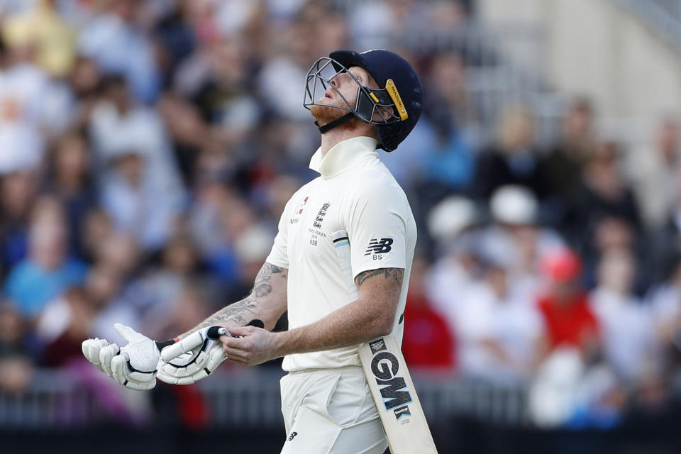 England's Ben Stokes returns to the pavilion after being dismissed during day five of the fourth Ashes Test cricket match between England and Australia at Old Trafford in Manchester, England, Sunday Sept. 8, 2019. (AP Photo/Rui Vieira)