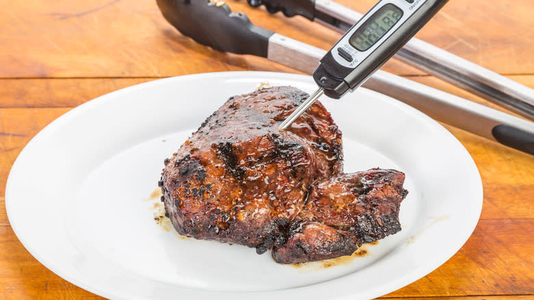 beef steak with meat thermometer