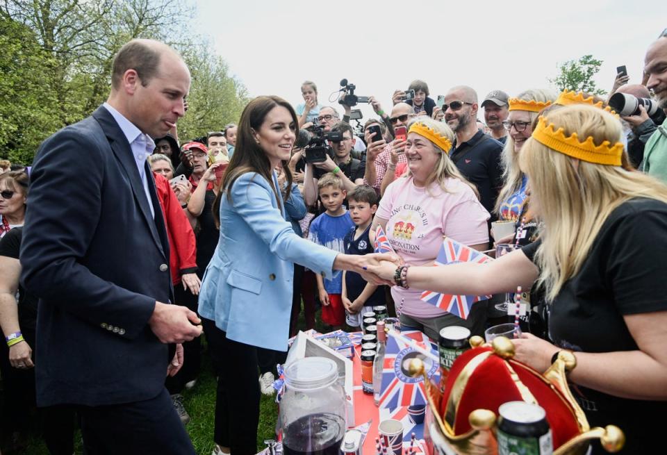 The Prince and Princess of Wales meet well-wishers at Windsor (REUTERS)