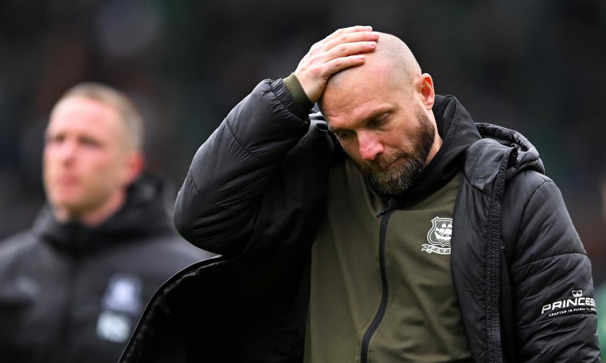 <span>Ian Foster cuts a dejected figure after Plymouth’s 1-0 defeat by Bristol City.</span><span>Photograph: Harry Trump/Getty Images</span>