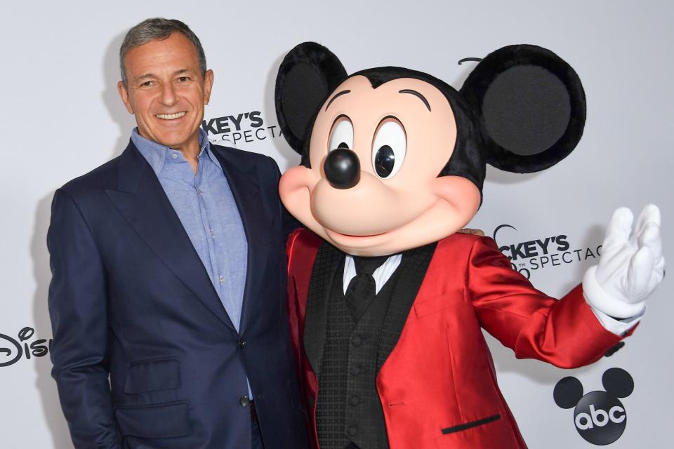 Walt Disney Company Chairman and CEO Robert A Iger poses with Mickey Mouse attends Mickey's 90th Spectacular at The Shrine Auditorium on October 6, 2018 in Los Angeles.