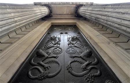 An engraved door is seen on the outside of the Bank of England in the City of London, August 7, 2013. REUTERS/Toby Melville
