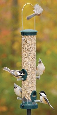 These feeders manufactured in Warren will bring all the feathered friends to the yard.