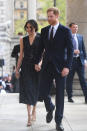 <p>Prince Harry and Meghan Markle attended a memorial service at St Martin-in-the-Fields to mark the 25th anniversary of the murder of Stephen Lawrence. For the service, the 36-year-old donned a spring-ready dress by Hugo Boss and teamed the look with her trademark messy bun. <em>[Photo: PA]</em> </p>