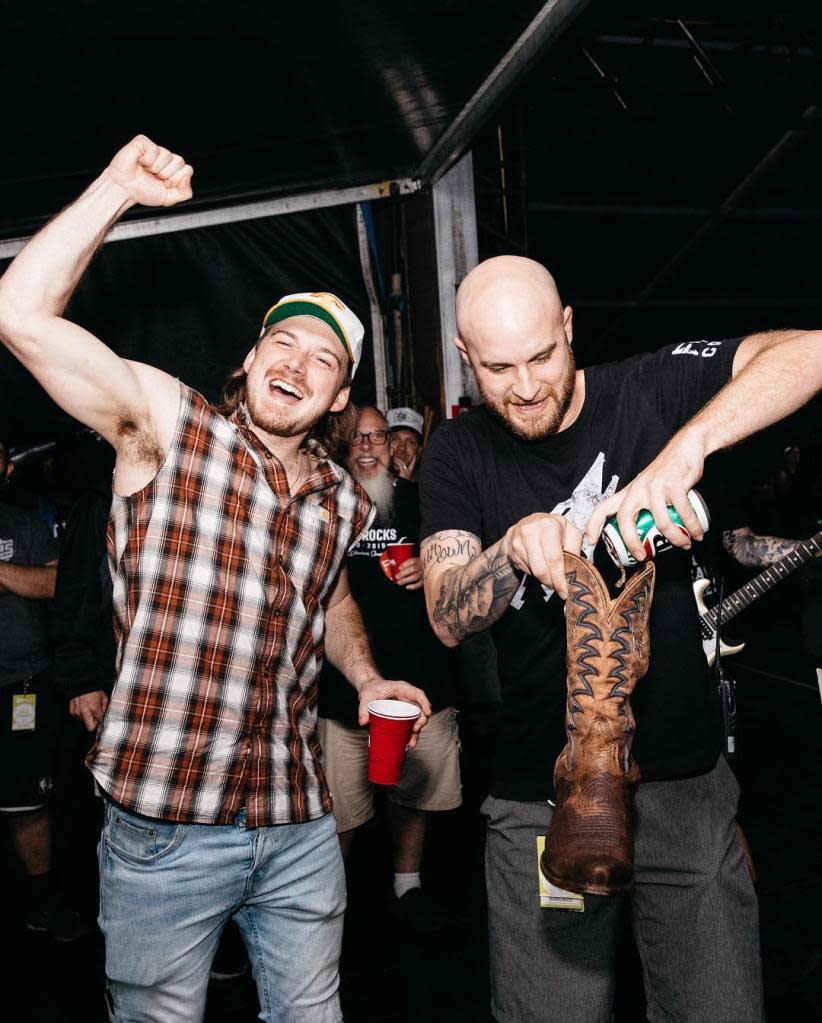 In 2019, Wallen posted an Instagram photo from Australia, prepping to drink beer from a cowboy boot. morganwallen/instagram