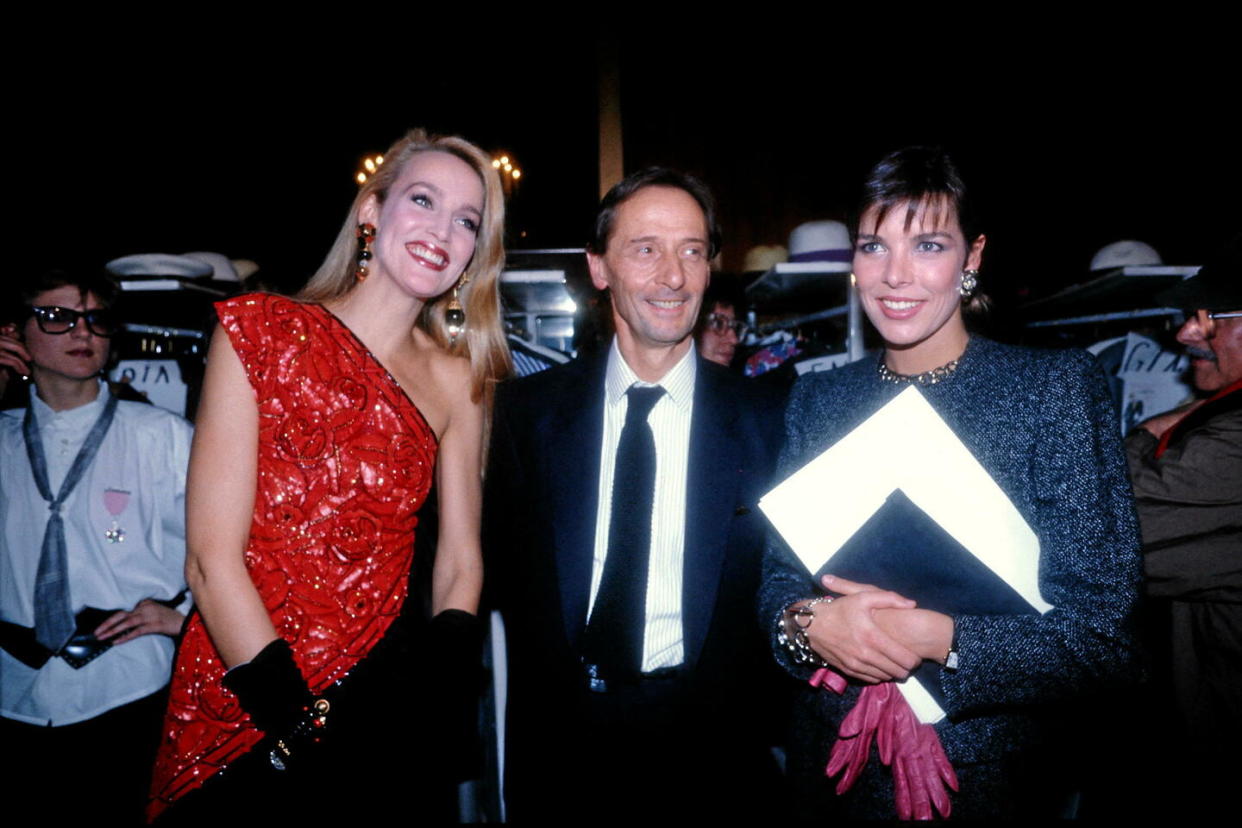 Marc Bohan en 1985, entouré de Caroline de Monaco et de Jerry Hall.  - Credit:JOEL ROBINE / AFP