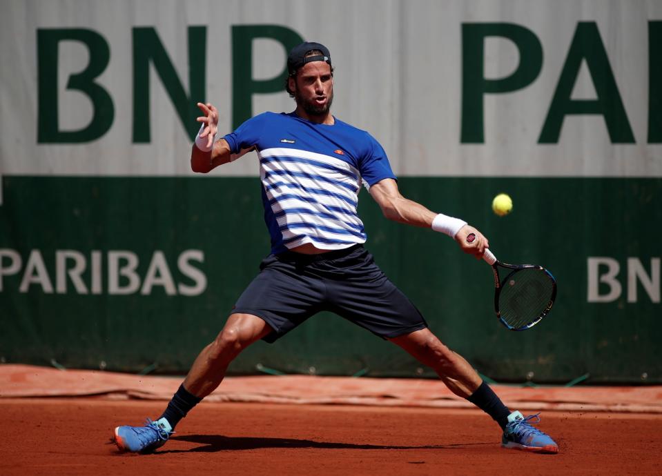 Spain's Feliciano Lopez in action during his second round match against Spain's David Ferrer Reuters / Benoit Tessier