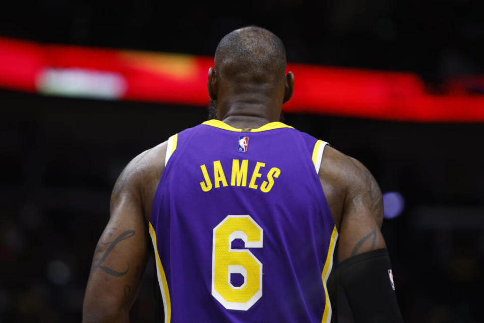 LeBron James stands on the court at Smoothie King Center in New Orleans in March 2022 before the Los Angeles Lakers’ game against the New Orleans Pelicans. (Photo by Sean Gardner/Getty Images)