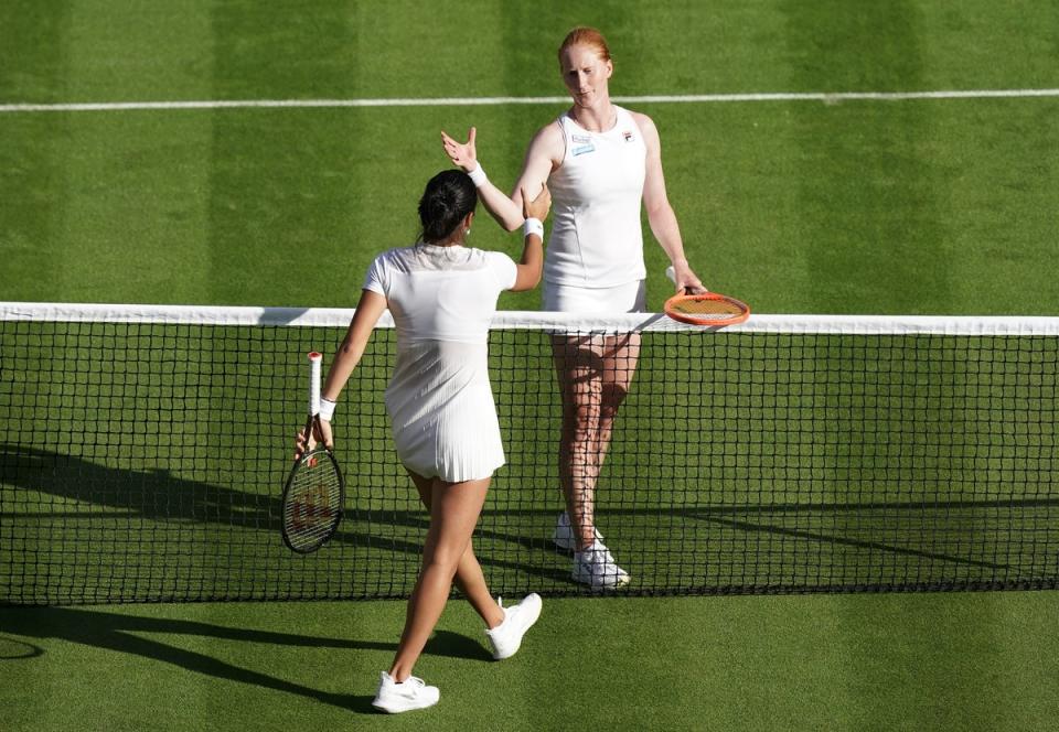 Emma Raducanu shakes hands with Alison Van Uytvanck after her victory (Aaron Chown/PA) (PA Wire)