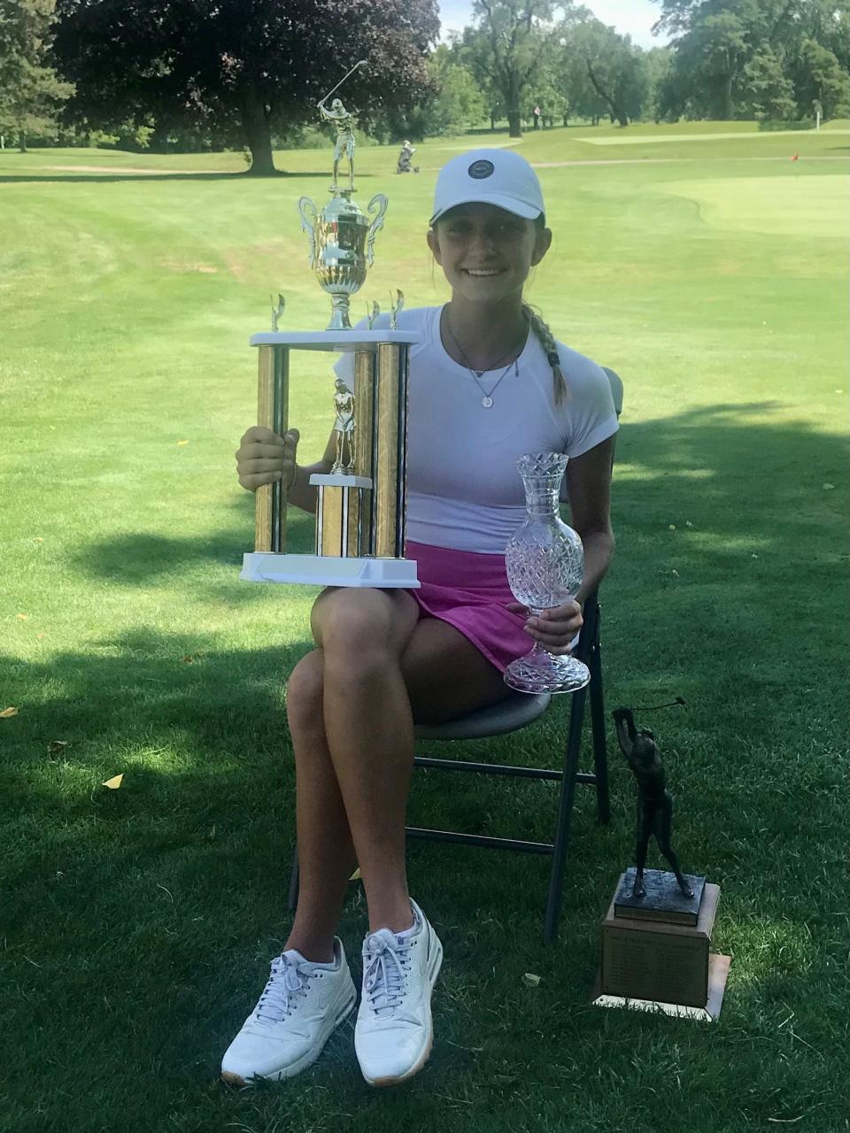 Perrysburg's Sydney Deal poses with the trophies she earned at the end of the two-day, 36-hole Ohio Junior Girls Championship completed Tuesday at Marion Country Club.