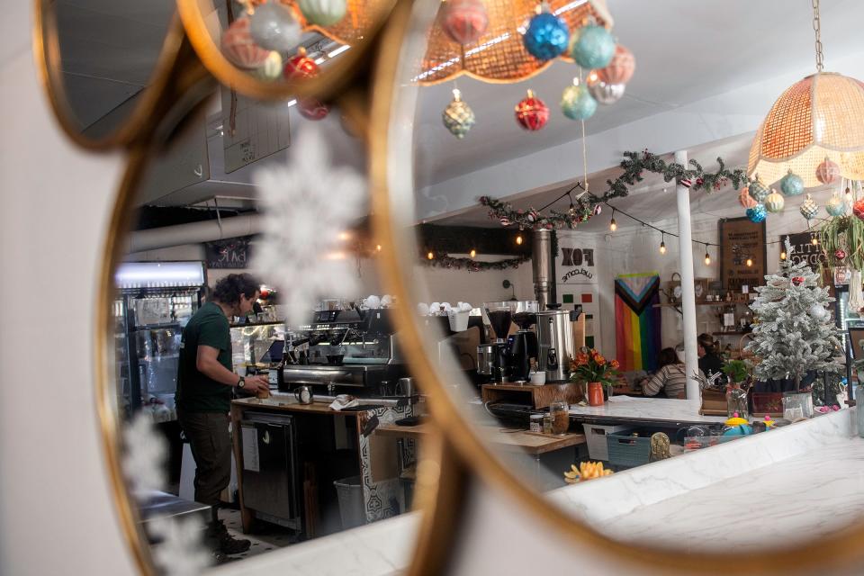 Arian Brazenwood makes drinks for customers at The Fox Den Coffee shop in Fort Collins on Nov. 13, 2023.