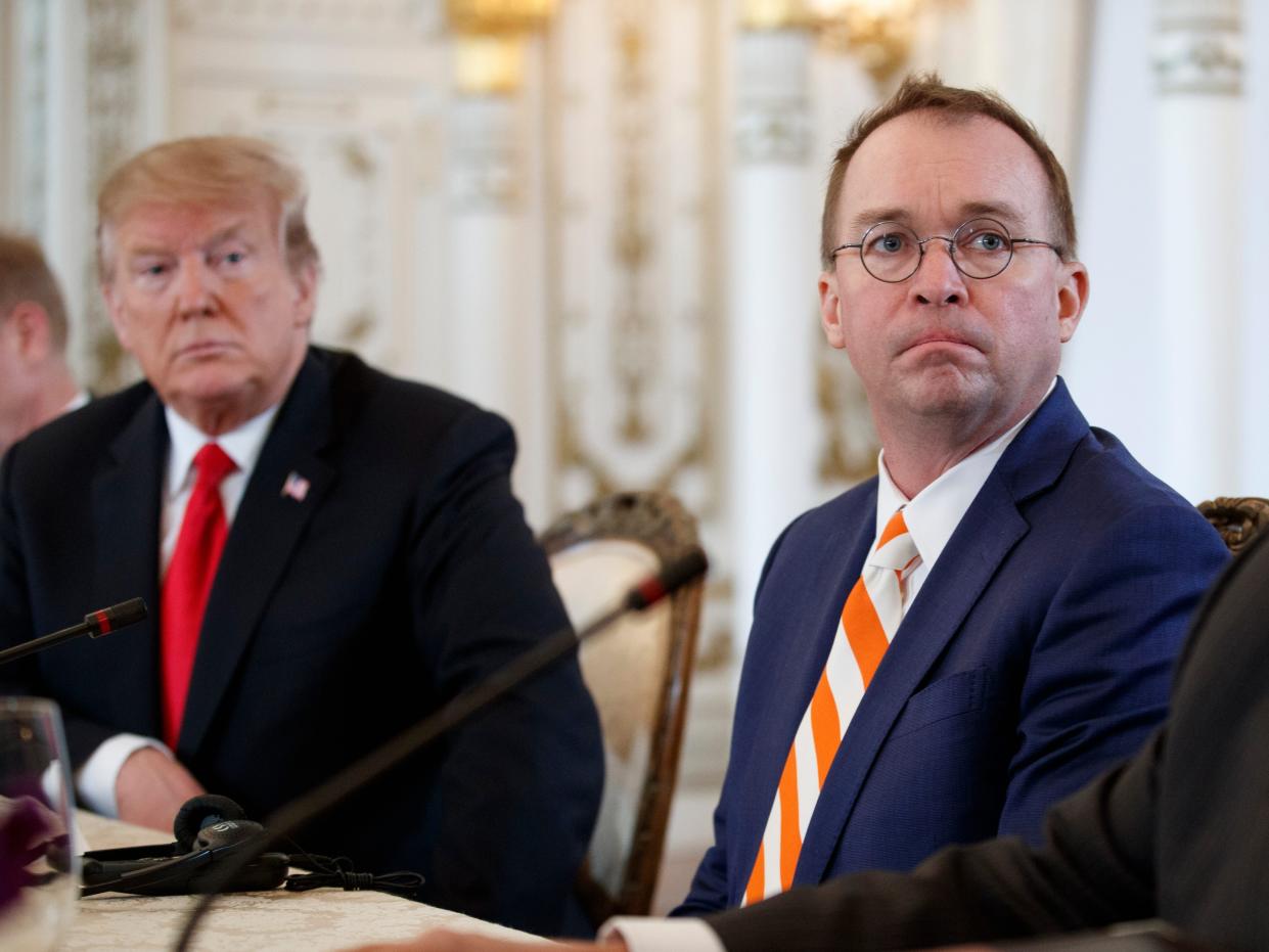 From left, President Donald Trump and acting White House chief of staff Mick Mulvaney, and Deputy Secretary of State John Sullivan, sit together during a meeting with Caribbean leaders at Mar-A Lago, Friday, March 22, 2019, in Palm Beach, Fla.