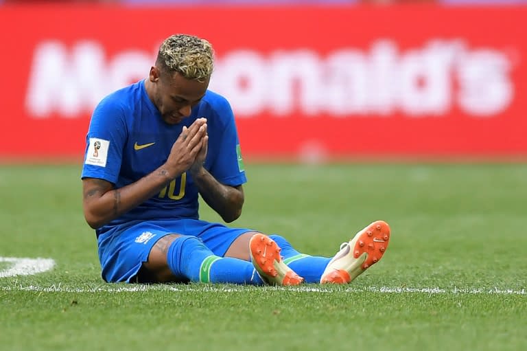 Neymar prays after Brazil beat Costa Rica 2-0 in their World Cup match in Saint Petersburg