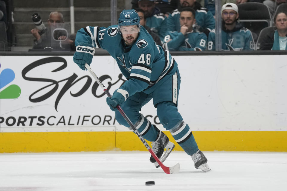 San Jose Sharks center Tomas Hertl skates with the puck against the Los Angeles Kings during the second period of an NHL hockey game in San Jose, Calif., Tuesday, Dec. 19, 2023. (AP Photo/Jeff Chiu)