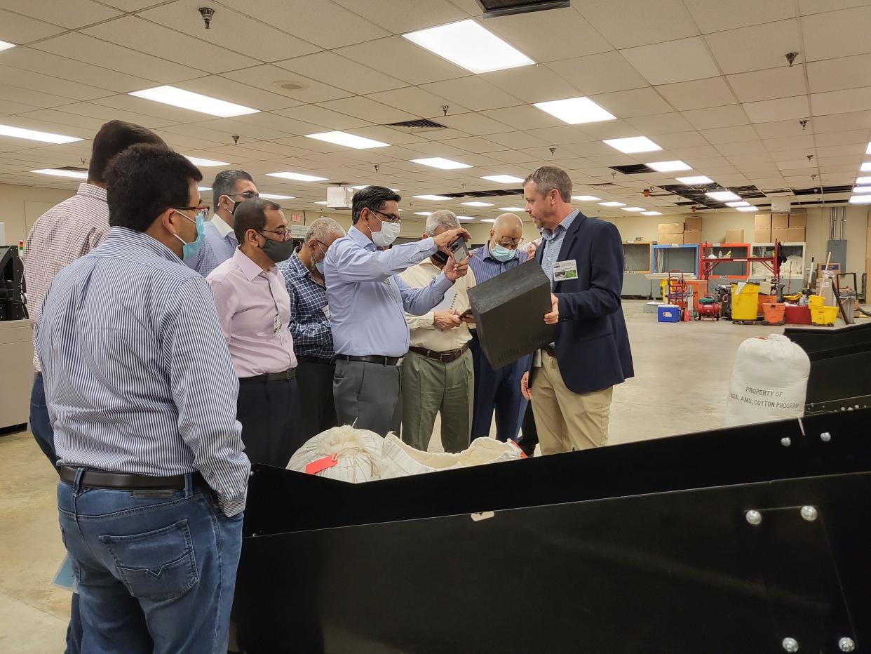 Executives from textile manufacturers in Pakistan tour the USDA Classing Office in Bartlett on Tuesday, July 26, 2022, as part of a program from the National Cotton Council to promote exports of U.S. cotton.