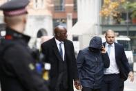 Former undercover reporter for the News of the World and the Sun on Sunday, Mazher Mahmood (2nd R), arrives for sentencing at the Old Bailey in London, Britain October 21, 2016. REUTERS/Stefan Wermuth