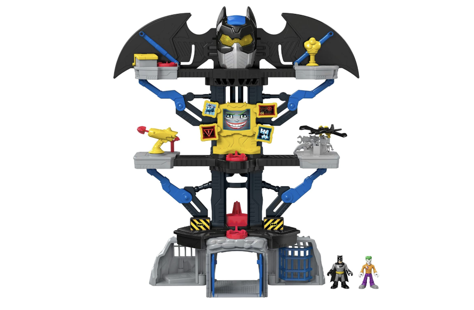 13) DC Super Friends Transforming Batcave Playset