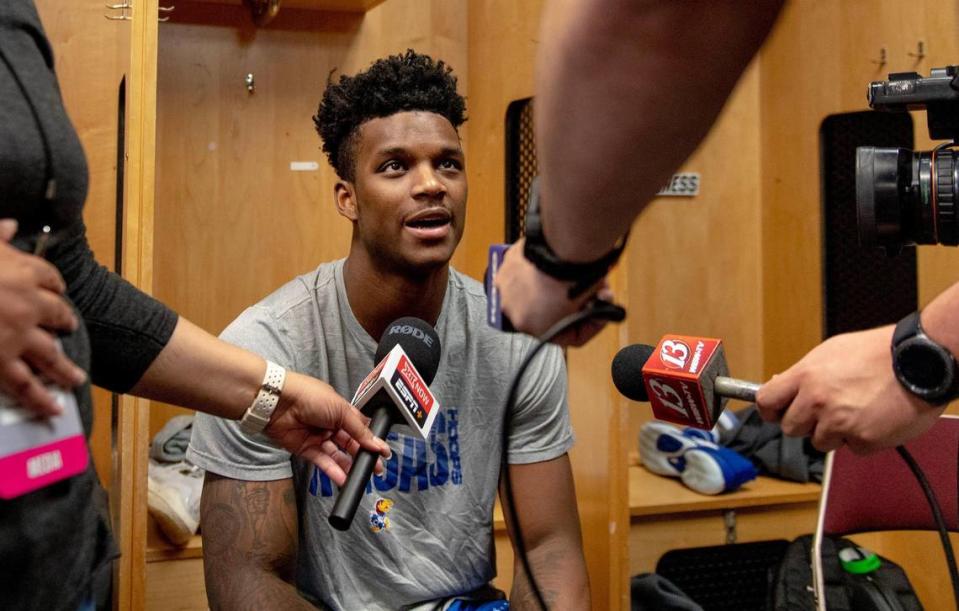 Kansas forward K.J. Adams Jr. speaks with media members in the locker room before a team shoot around a day ahead of Kansas’ first round game against Howard in the NCAA college basketball tournament Wednesday, March 15, 2023, in Des Moines, Iowa.