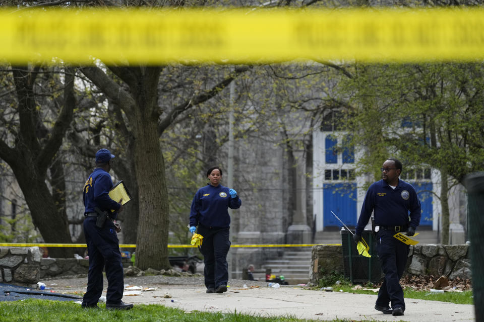 Investigators work the scene of a shooting at an Eid al-Fitr event in Philadelphia, Wednesday, April 10, 2024. (AP Photo/Matt Rourke)