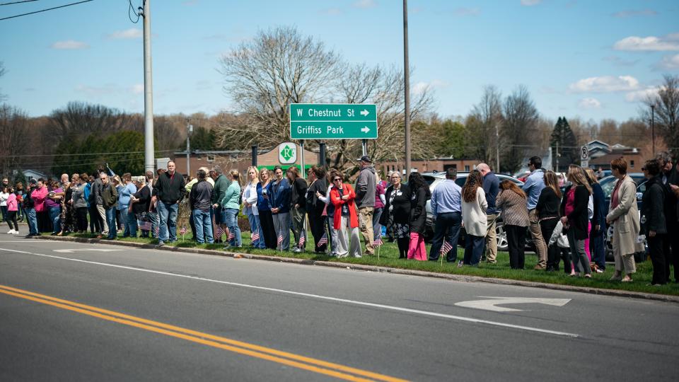 People line Turin Road in Rome, NY for fallen Syracuse Police Officer Michael Jensen on Tuesday, April 16, 2024.