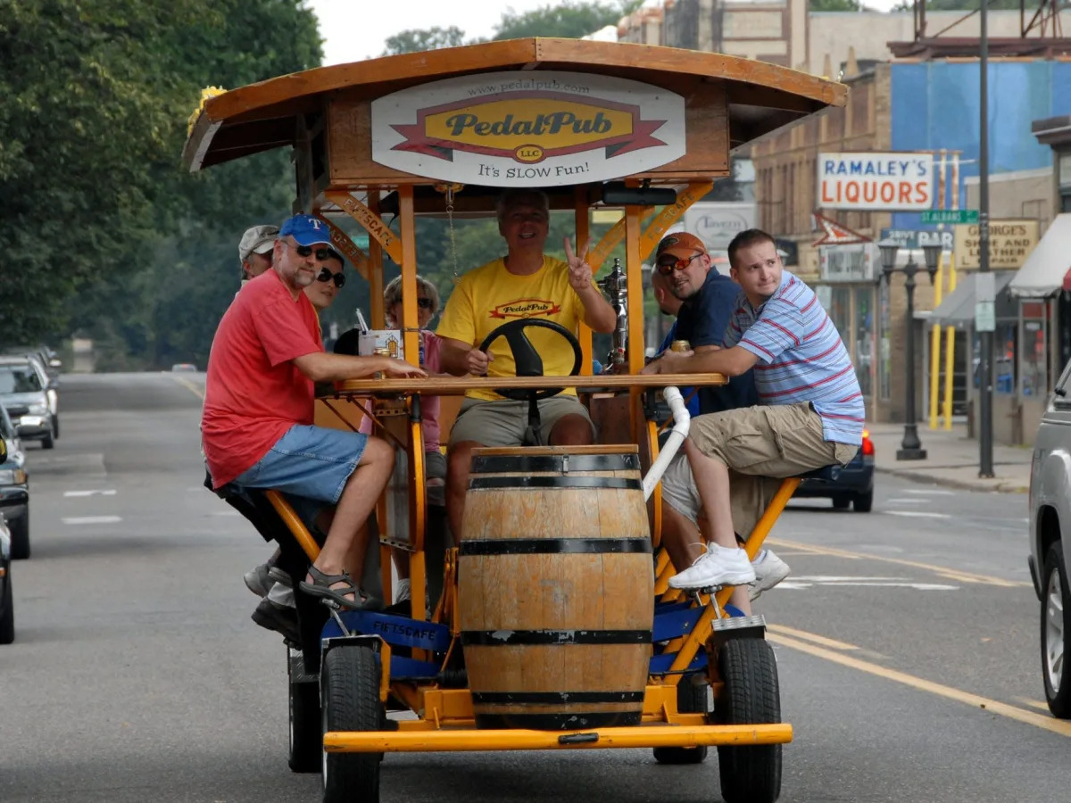 Passengers trapped underneath a 'pedal pub' that overturned in Atlanta, injuring..