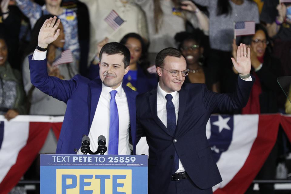 Democratic presidential candidate Pete Buttigieg, left, waves with his husband Chasten Buttigieg after declaring victory in Iowa on Feb. 3, despite the absence of complete results. (Photo: Tom Brenner/Getty Images)