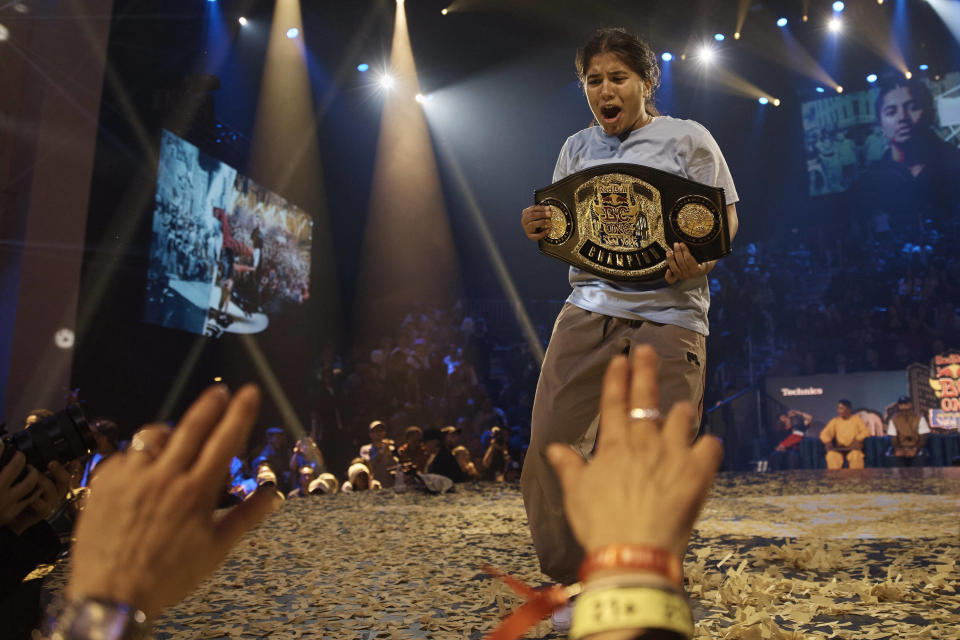 India Sardjoe, also known as B-Girl India, from the Netherlands, wins the championship in the B-girl Red Bull BC One World Final at Hammerstein Ballroom on Saturday, Nov. 12, 2022, in Manhattan, New York. The International Olympic Committee announced two years ago that breaking would become an official Olympic sport, a development that divided the breaking community between those excited for the larger platform and those concerned about the art form’s purity. (AP Photo/Andres Kudacki)