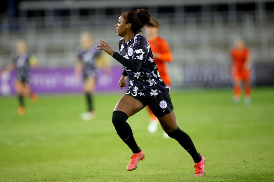Mar 25, 2022; Louisville, KY, USA; Racing Louisville FC forward Sh'Nia Gordon (23) runs upfield against the Houston Dash in the second half of a NWSL Challenge Cup match at Lynn Family Stadium. Mandatory Credit: EM Dash-USA TODAY Sports
