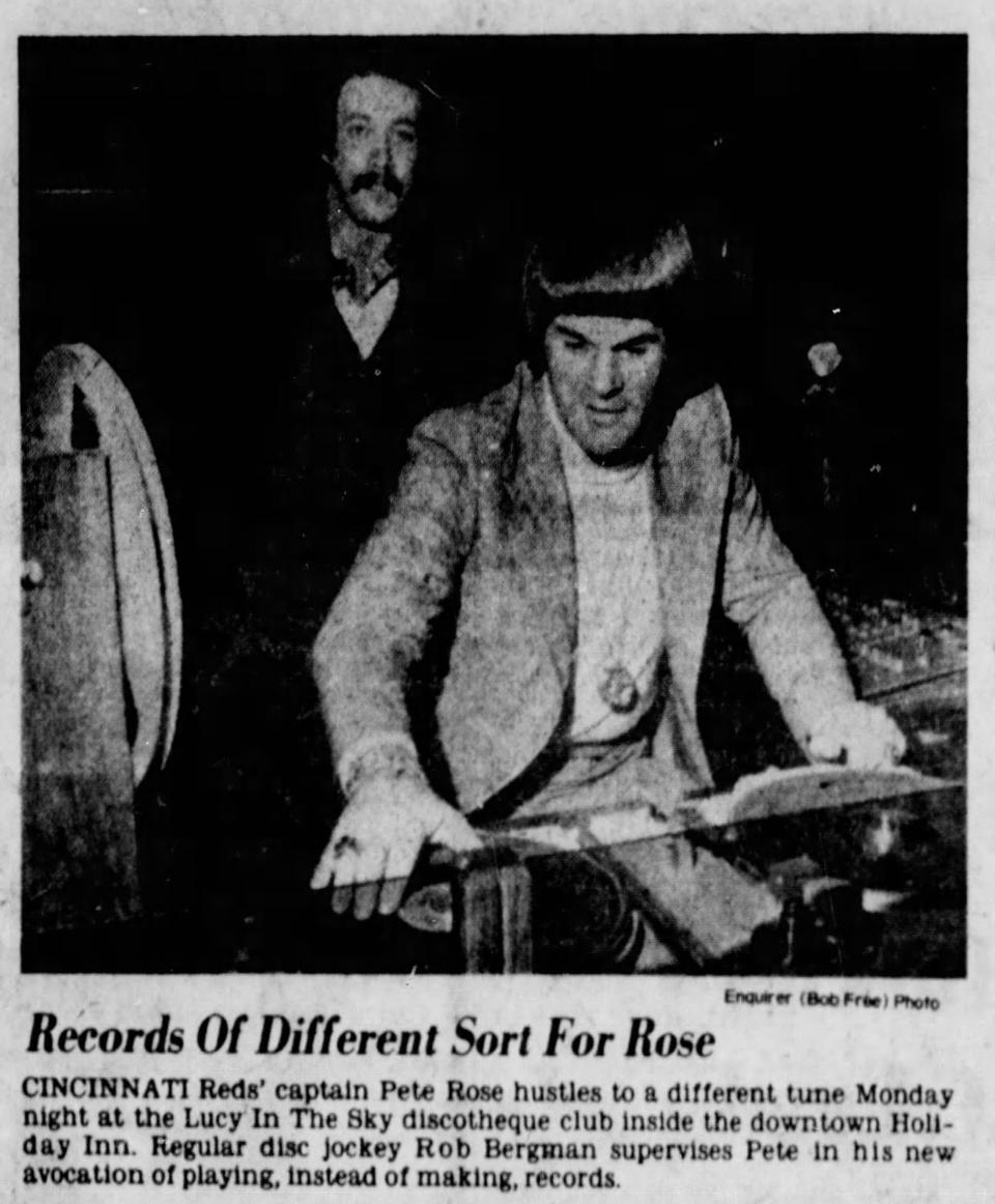Cincinnati Reds captain Pete Rose hustles to a different tune Monday night at the Lucy's in the Sky Nite Club inside the Holiday Inn in this Feb. 1, 1977 Enquirer photo. Regular disc jockey Rob Bergman supervises.