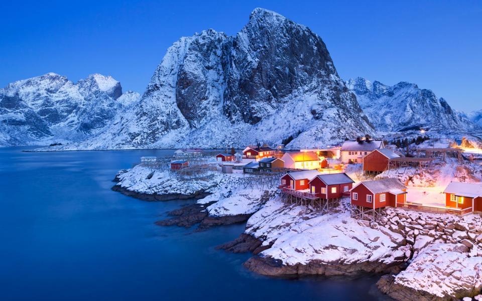 The Lofoten Islands attract visitors for their fishing and views of such natural phenomenon as the northern lights and the midnight sun.