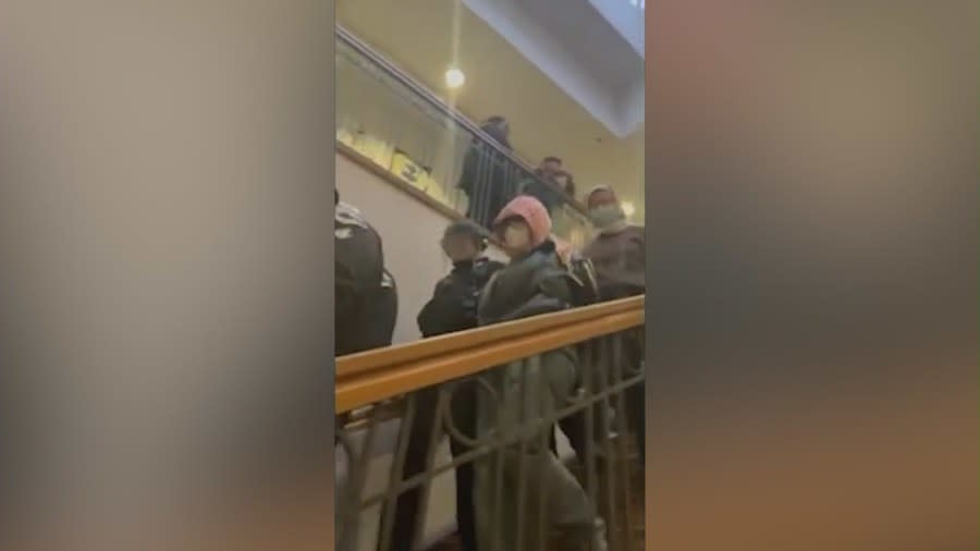 Video of the protest at Alexander Hall taken by Samson Zhang shows police officers detaining demonstrators and escorting them down a staircase. (Samson Zhang)
