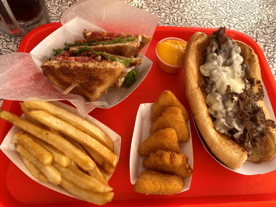 A BLT, cheesesteak, mac and cheese bites and cheese fries at Stewart's Root Beer in Tuckerton.