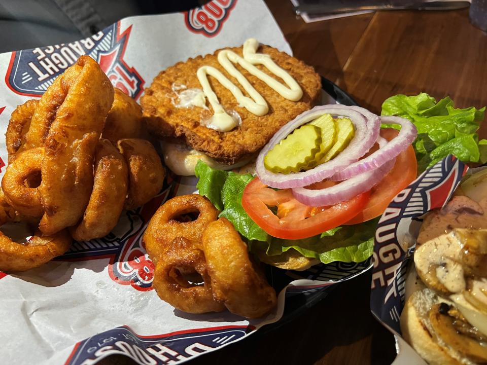 The breaded pork tenderloin at Beer Can Alley is one the new dishes.