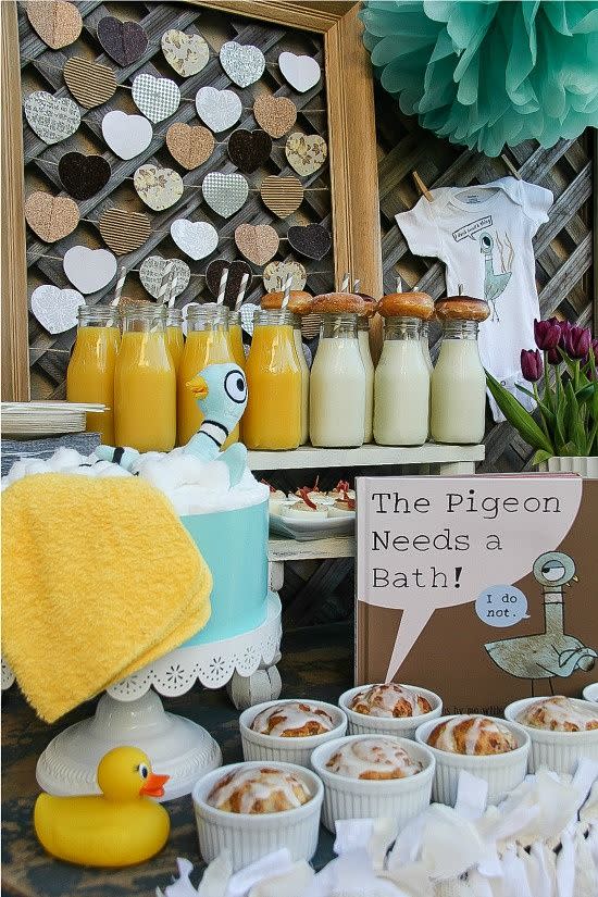 cookies, milk and other desserts are presented with a mo willems pigeon theme, a great baby shower idea