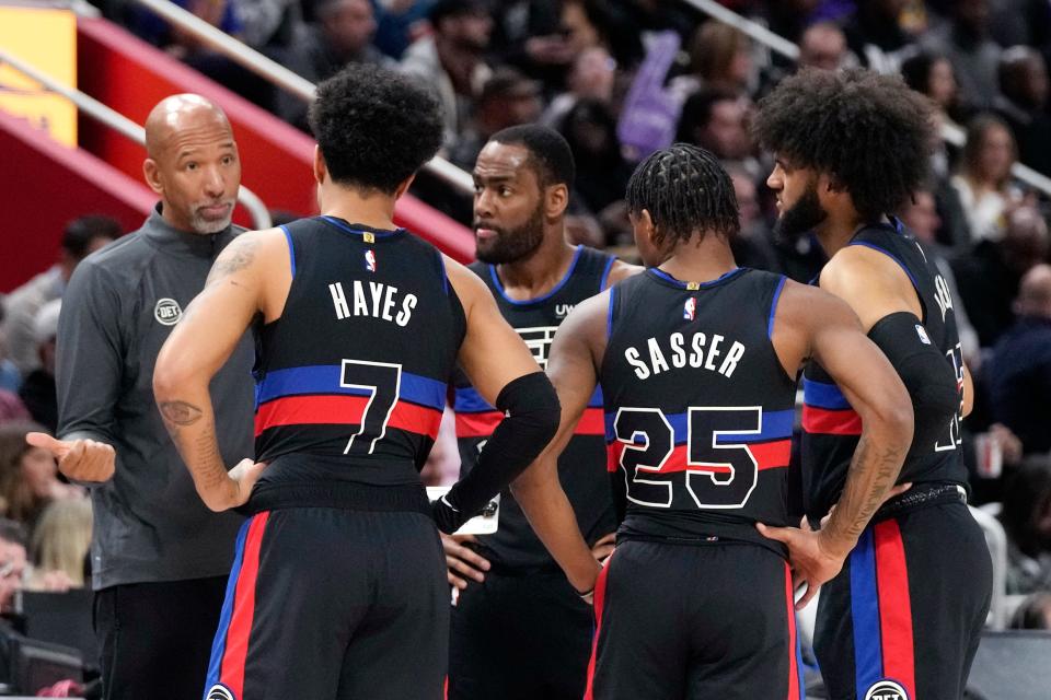 Pistons coach Monty Williams talks with (from left) guards Killian Hayes, Alec Burks, Marcus Sasser and forward Isaiah Livers during the first half vs. the Lakers, Wednesday, Nov. 29, 2023, at Little Caesars Arena.