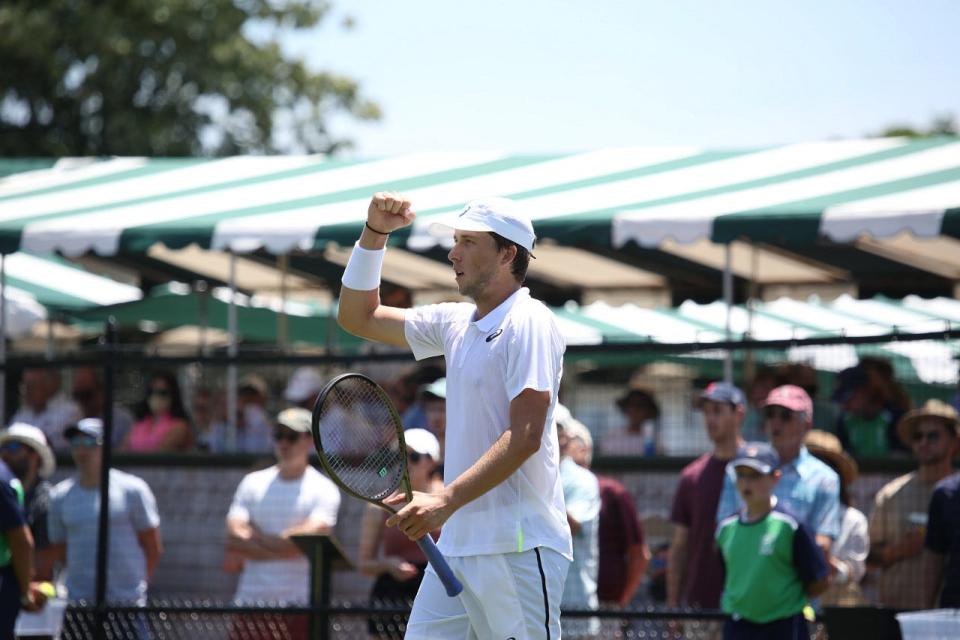 Brandon Holt, shown Sunday at the International Tennis Hall of Fame, where he won a qualifying match, said he was never pushed into tennis, but gravitated toward it naturally. His mother is tennis great Tracy Austin.