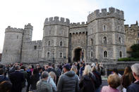 <p>WINDSOR, ENGLAND - SEPTEMBER 08: Members of the public gather outside of Windsor Castle on September 08, 2022 in Windsor, England. Elizabeth Alexandra Mary Windsor was born in Bruton Street, Mayfair, London on 21 April 1926. She married Prince Philip in 1947 and acceded the throne of the United Kingdom and Commonwealth on 6 February 1952 after the death of her Father, King George VI.Queen Elizabeth II died at Balmoral Castle in Scotland on September 8, 2022, and is survived by her four children, Charles, Prince of Wales, Anne, Princess Royal, Andrew, Duke Of York and Edward, Duke of Wessex. (Photo by Chris Jackson/Getty Images)</p> 