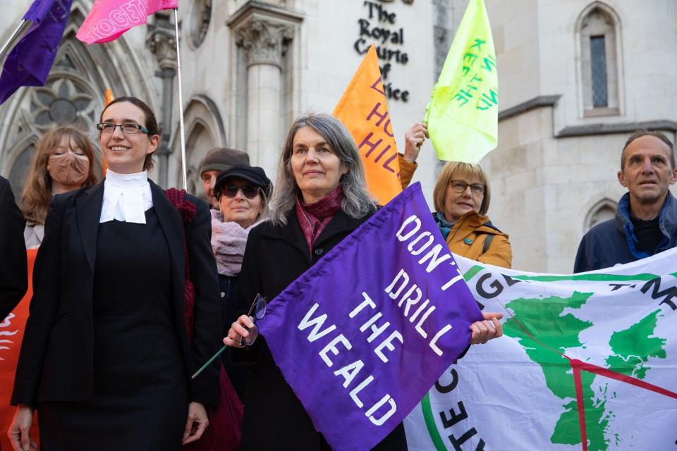 Sarah Finch stands with her lawyer outside the court of appeal in 2021