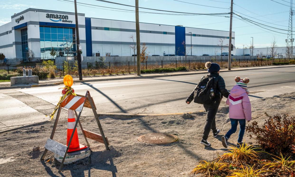 <span>An Amazon warehouse in Gage Park, Chicago, Illinois, a state that is home to hundreds of mega-warehouses for online shopping.</span><span>Photograph: Zbigniew Bzdak/The Guardian and Consumer Reports</span>