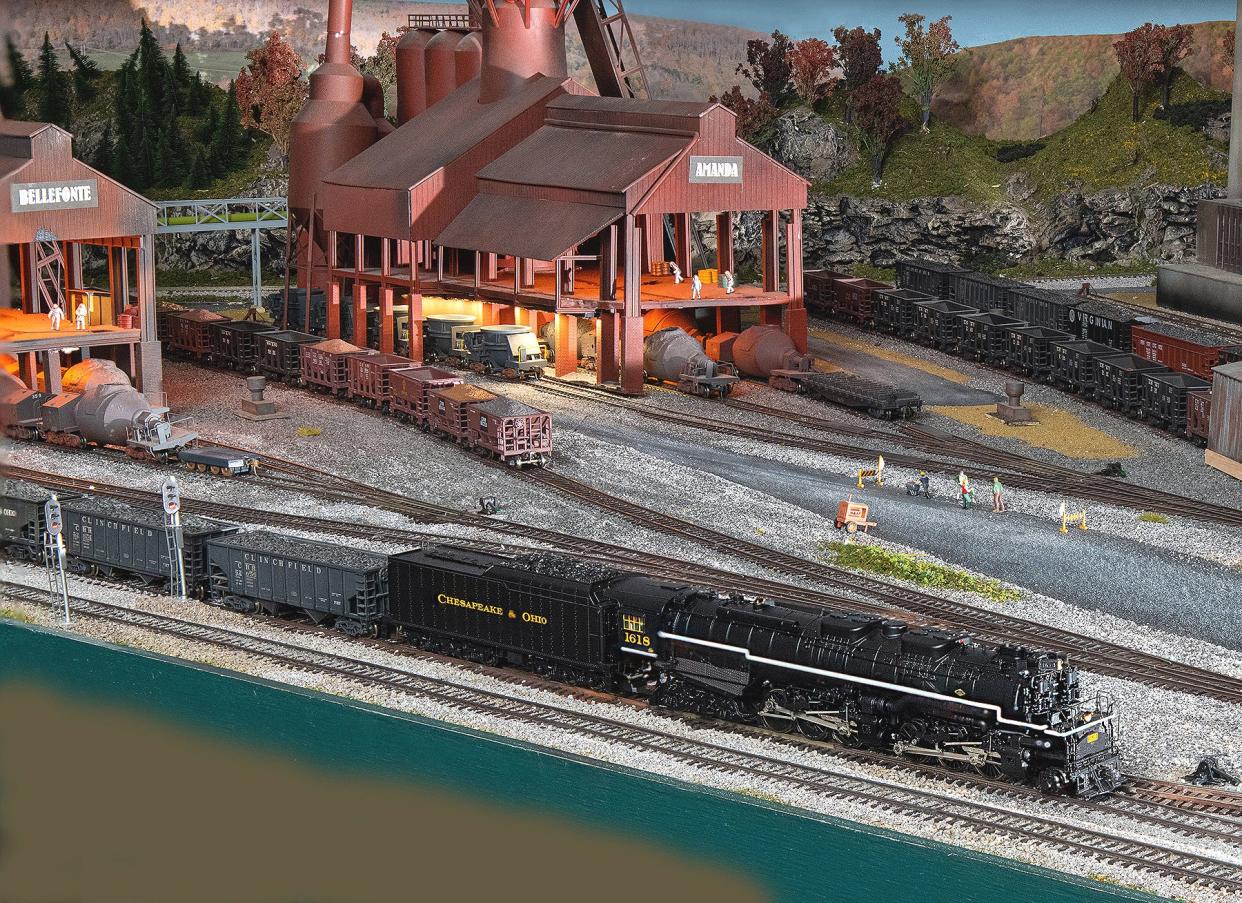 A Chesapeake & Ohio model train is pictured moving through one of the many layout scenes at the Blissfield Model Railroad Club, 109 E. Adrian St. The club will offer an open house and layout tours Saturday and Sunday, March 26 and 27. Admission is free, and registration is not required.